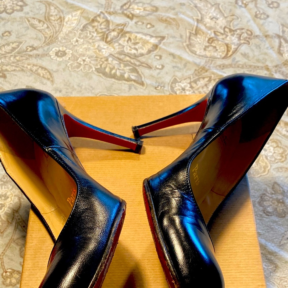 Christian Louboutin black pumps